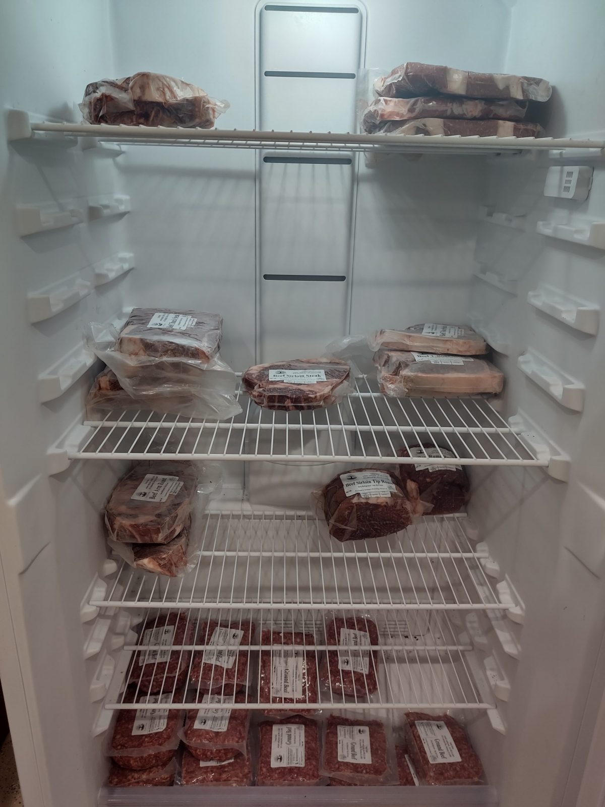 Photo by Ryan Nadig at Nadig Farms. Example of a standup freezer stacked with a standard eighth cow.