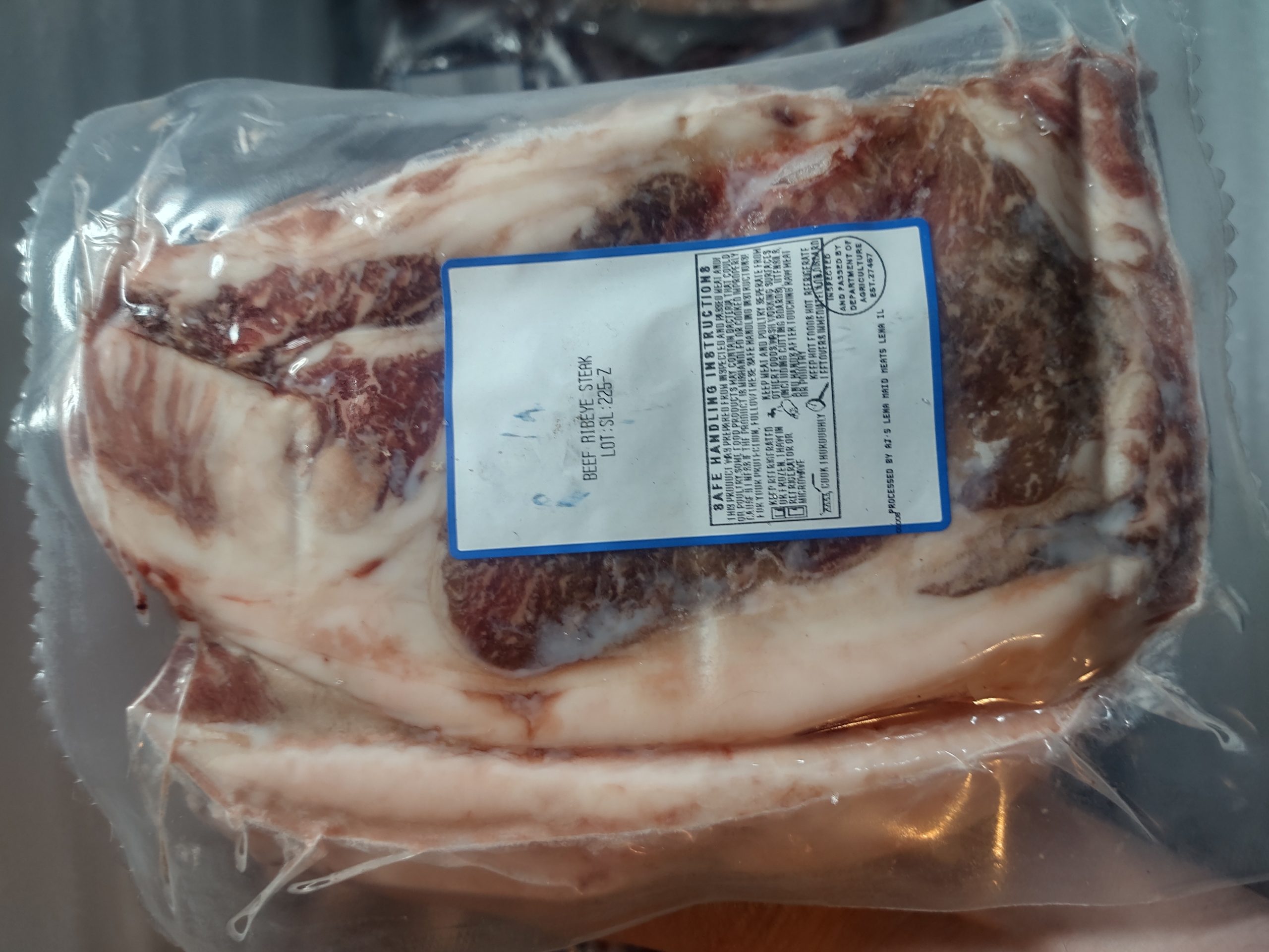 Vacuum-sealed frozen ribeye steak from Nadig Farms, locally raised farm beef available in the Chicagoland area.