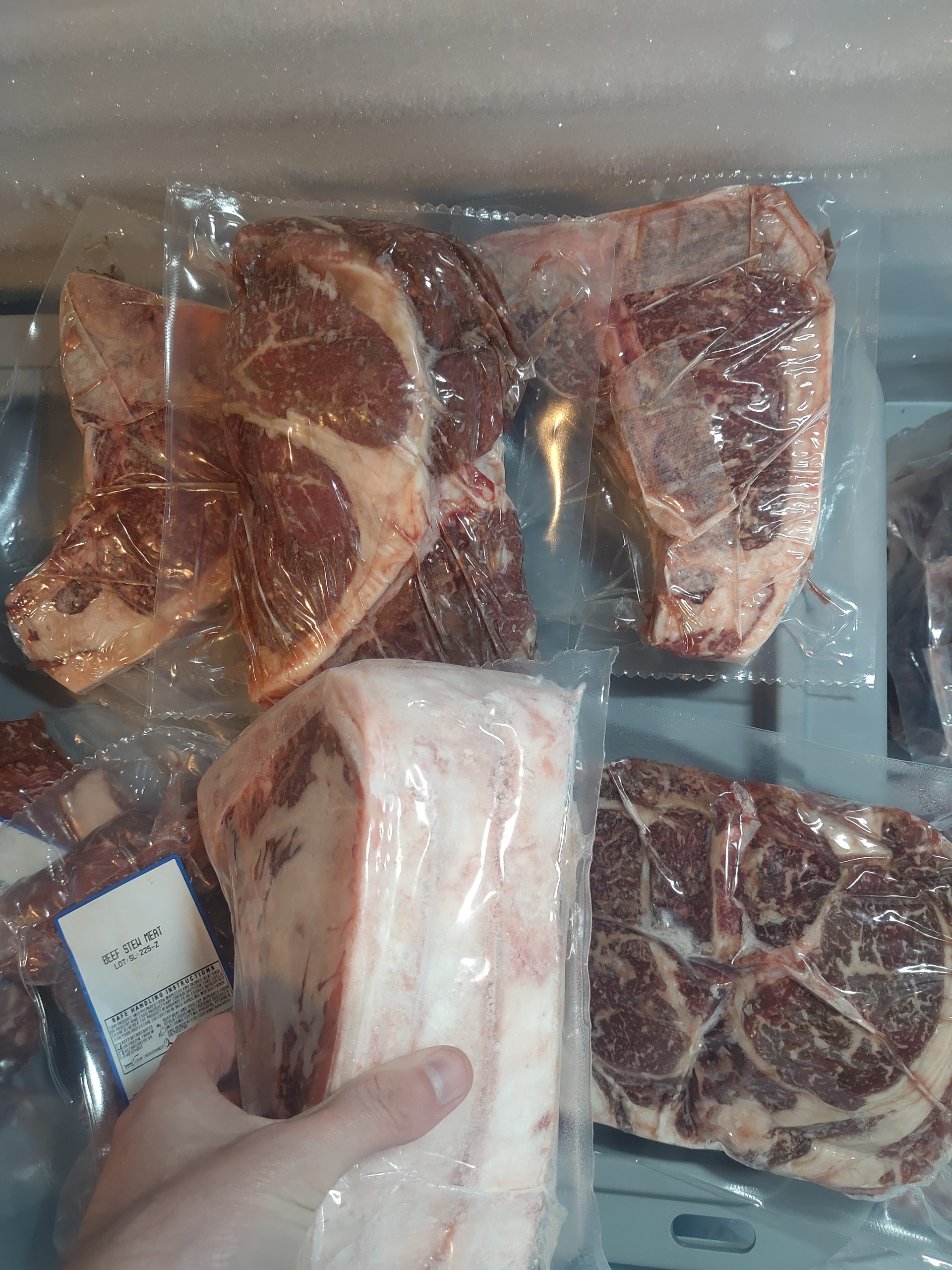 Vacuum-sealed frozen steaks from Nadig Farms, locally raised beef for Chicagoland customers.