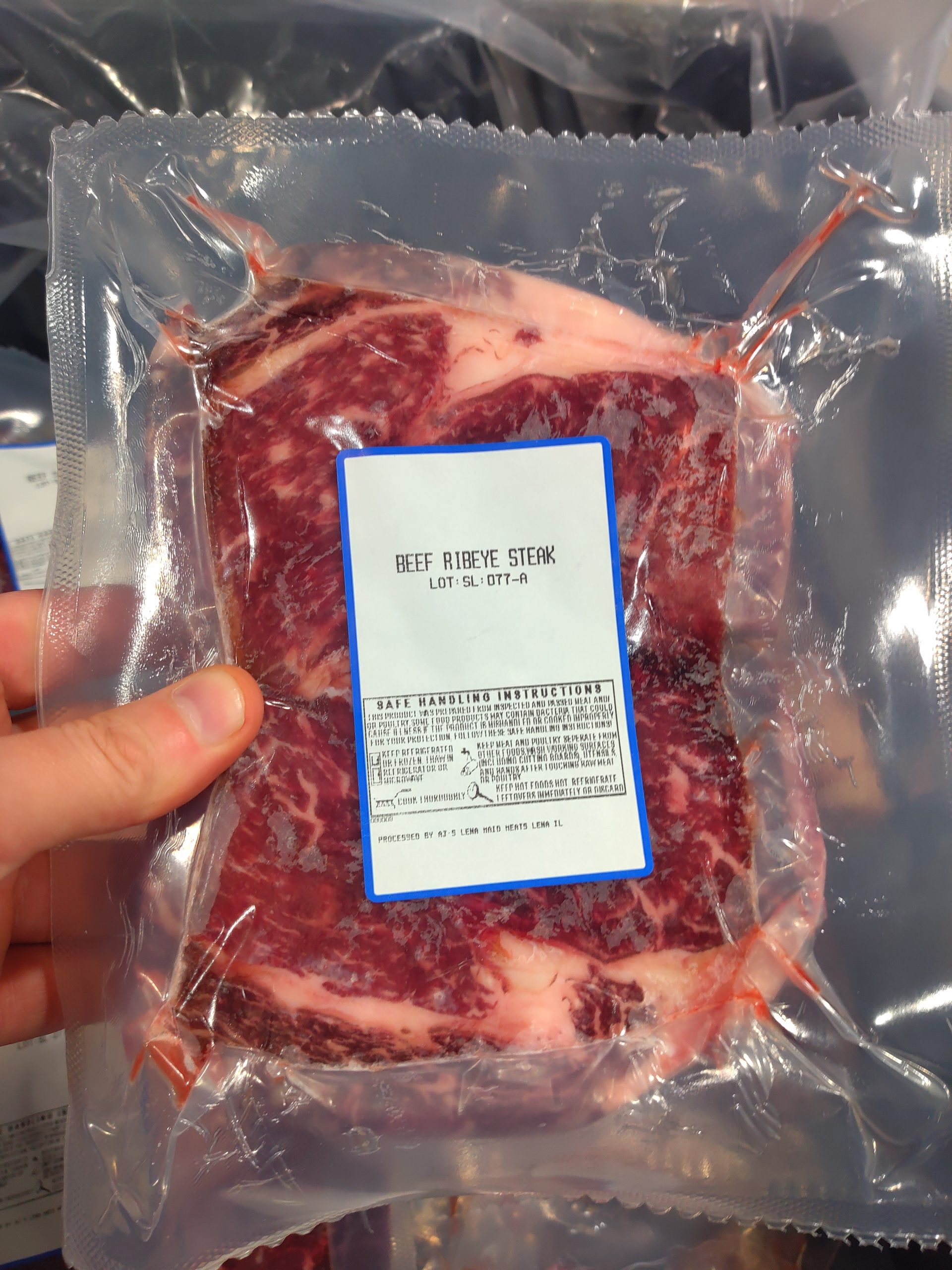 Vacuum-sealed frozen ribeye steak from Nadig Farms, locally raised beef and steaks for sale in the Chicagoland area