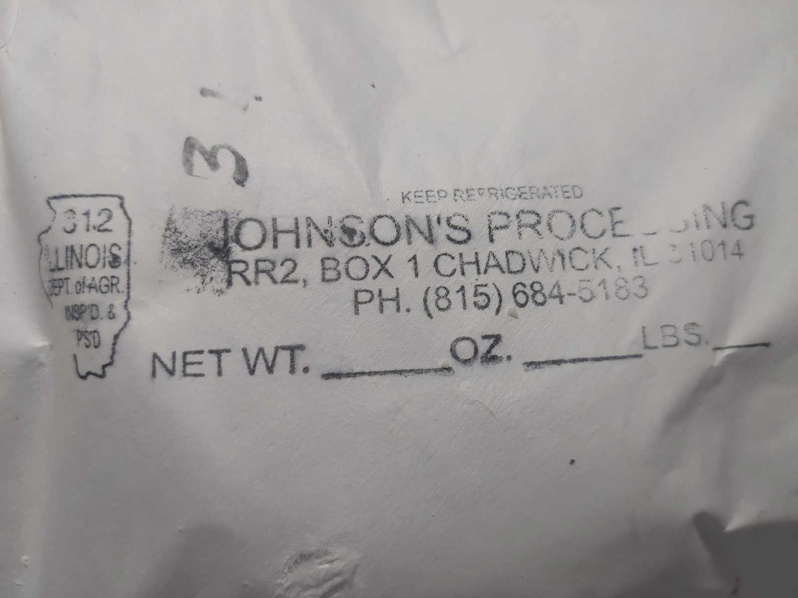 Illinois Department of Agriculture inspection stamp on a Johnson's Processing package label, Chadwick, IL.